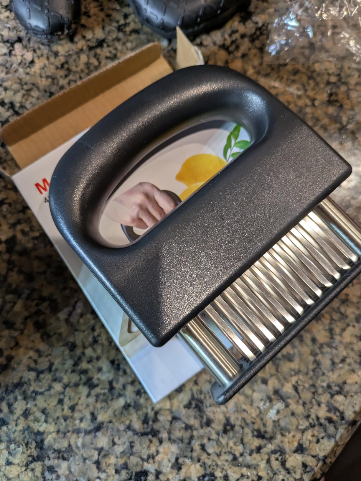 Close-up of JEREMYTIS meat tenderizer blades