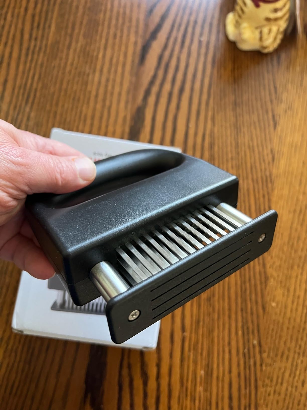 JEREMYTIS meat tenderizer handle and blades close-up