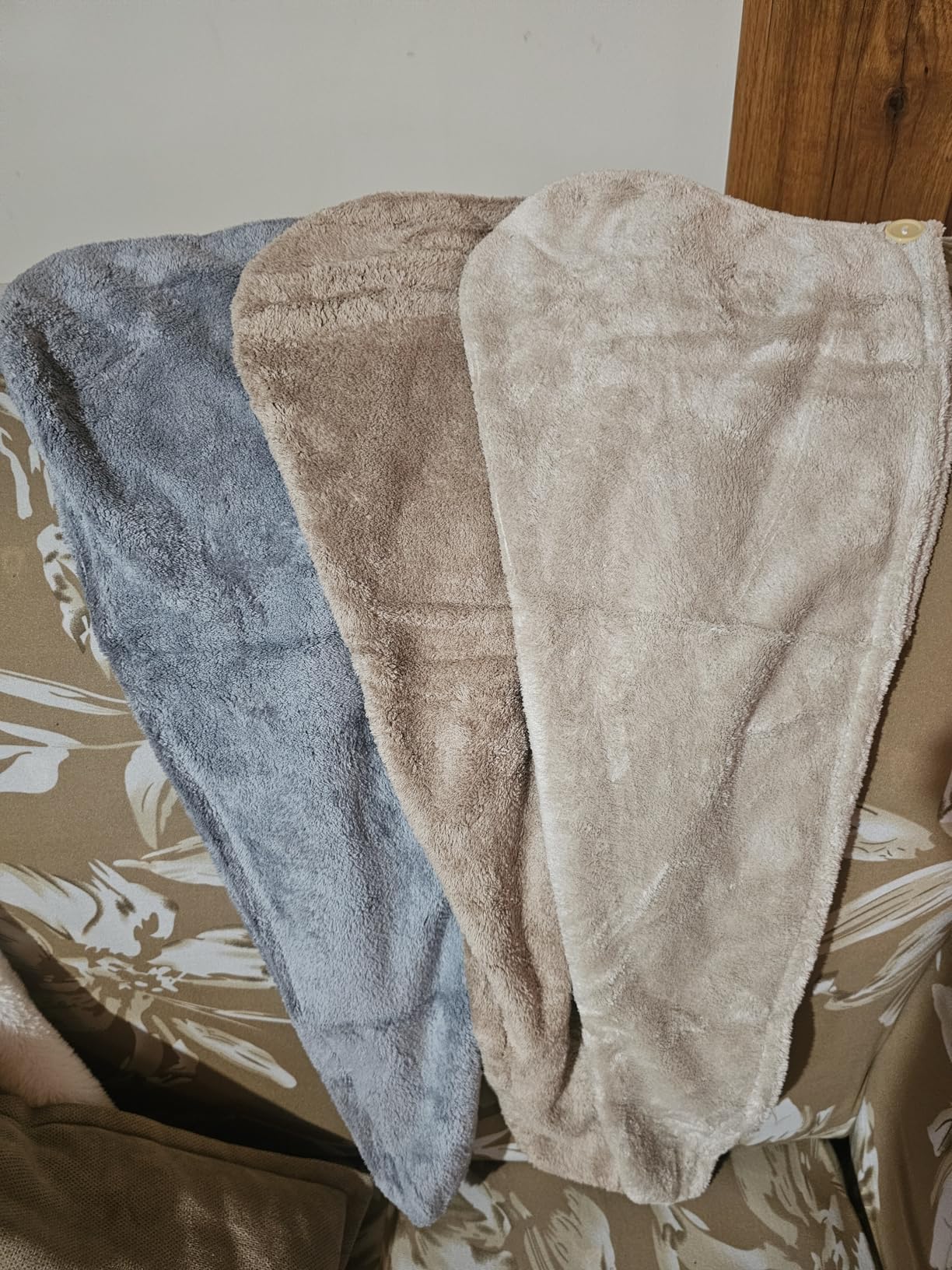 Customer photo showing multiple microfiber hair towel colors