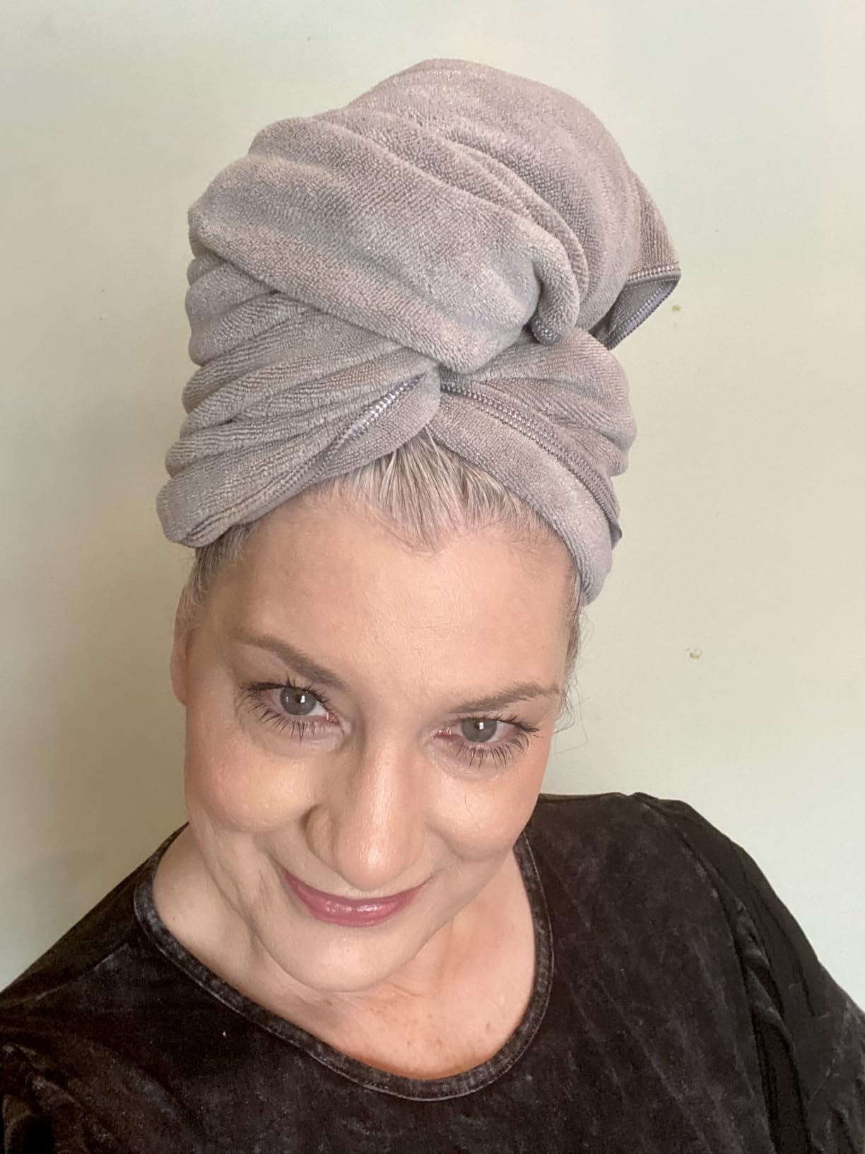 Customer selfie wearing microfiber hair drying cap