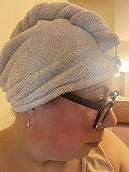 Customer wearing microfiber hair drying cap from side view