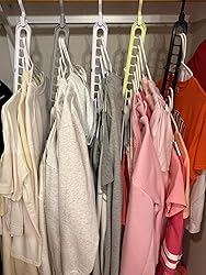 Customer closet with clothes on multicolor space saving hangers