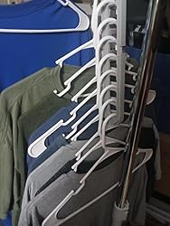 Customer shirts organized vertically on space saving hanger