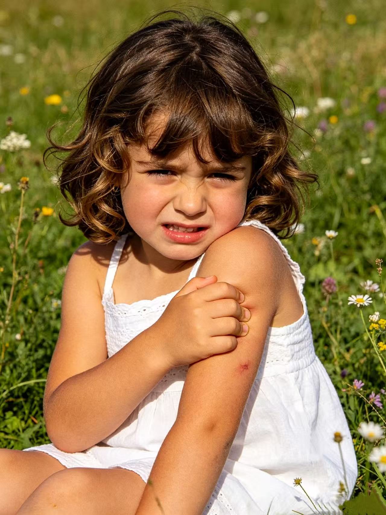 Peel and stick mosquito repellent sticker on clothing