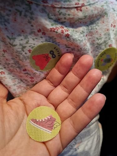 Mosquito repellent stickers attached to a shirt